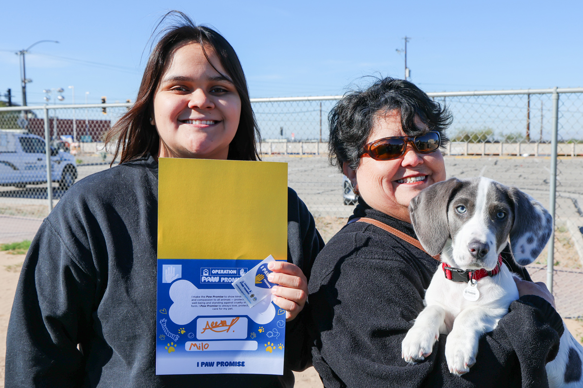 two females and a dog